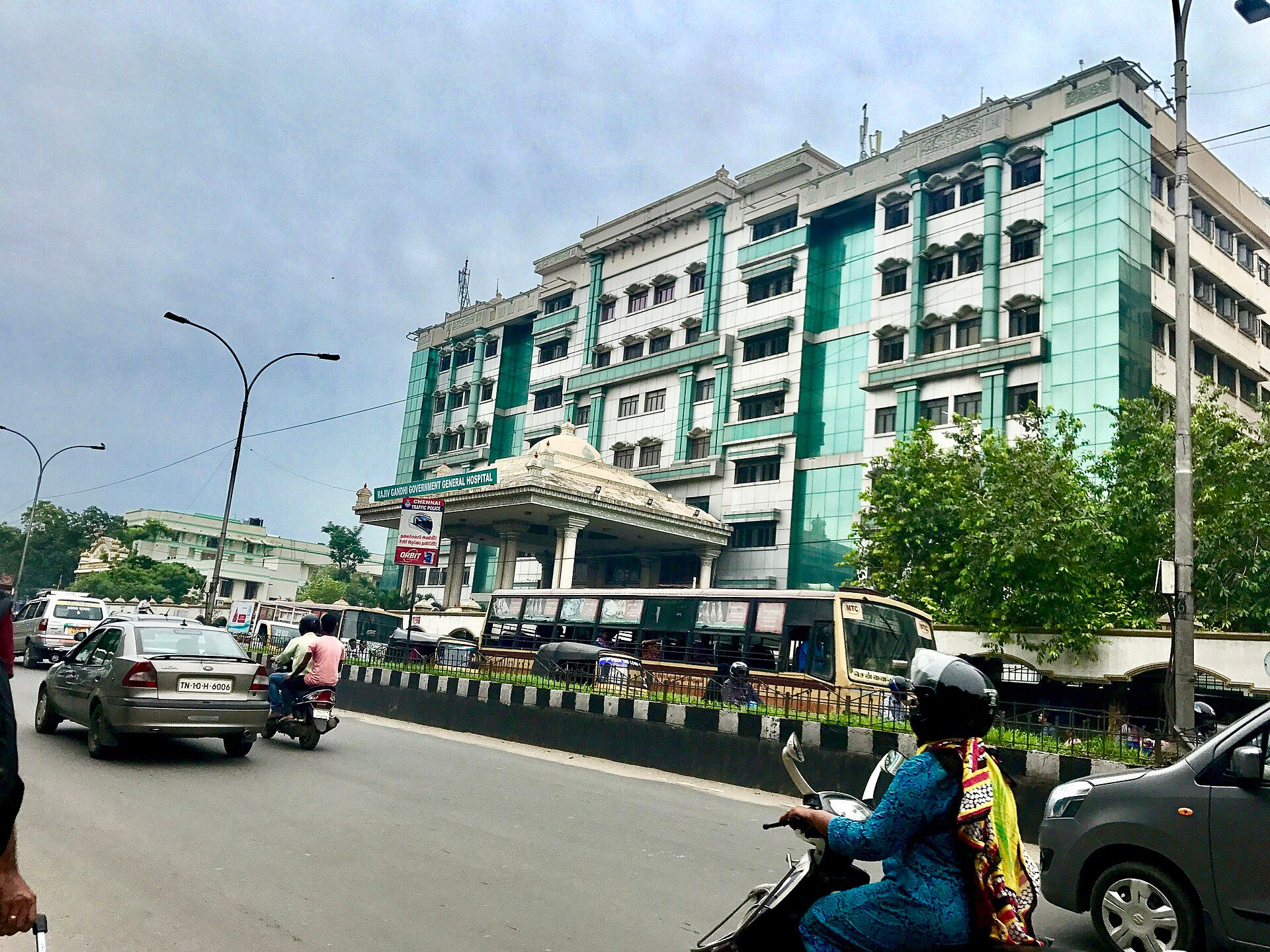 The Government General Hospital building in Chennai seen from a busy road